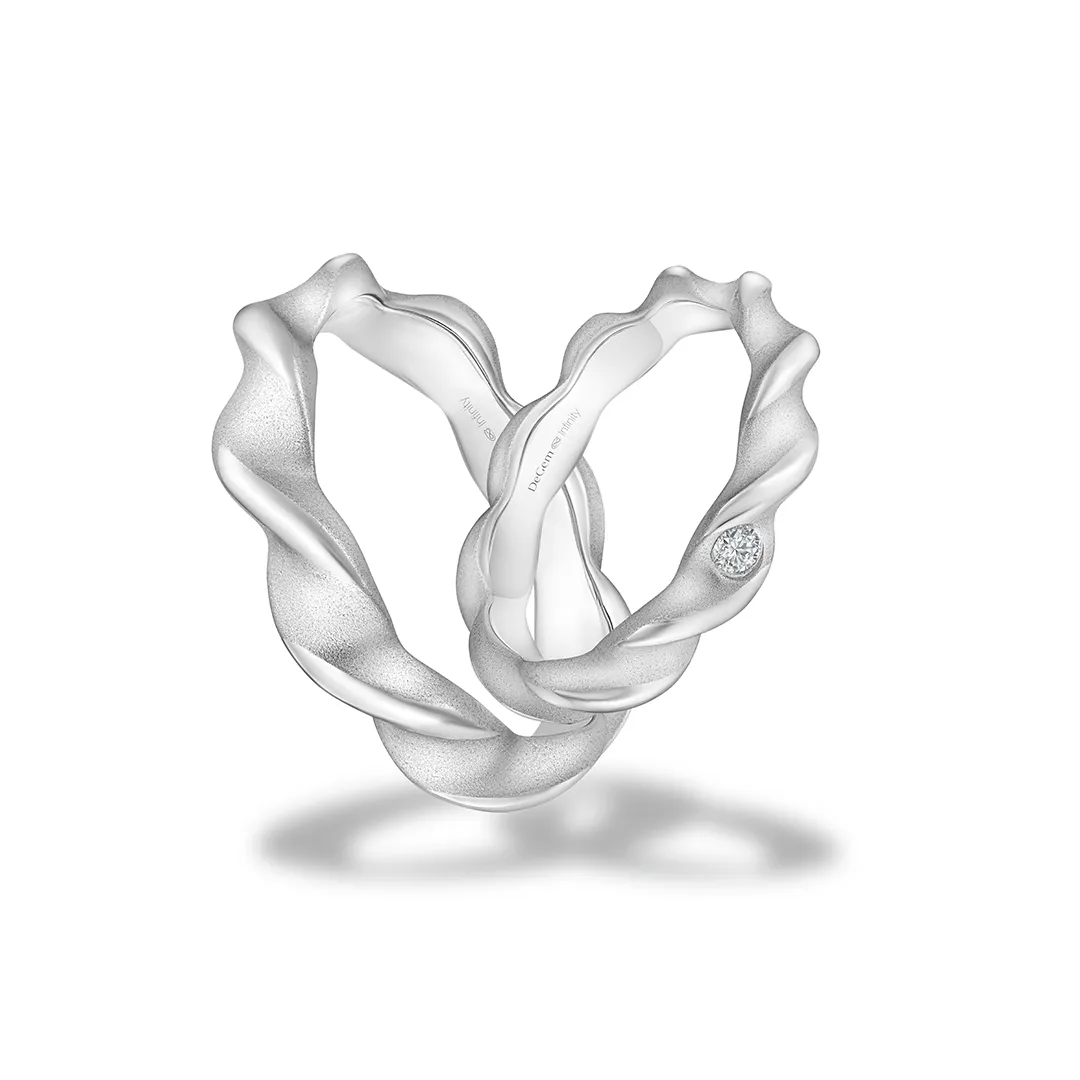 INFINITY® FLOW Wedding Band Featuring 18K White Gold, And 1 Round Brilliant Diamond On The Female Band - DeGem Malaysia